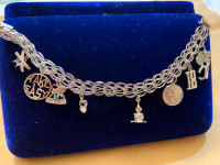 STERLING SILVER CHARM BRACELET