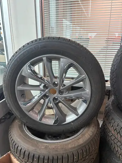 Studded winters with two seasons on the OEM rims Were on 2023 Encore