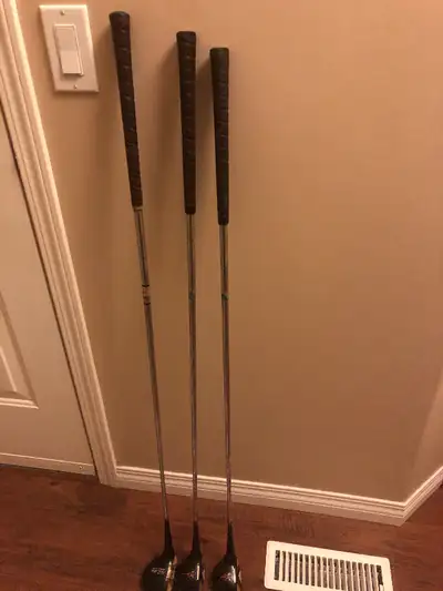 3 Vintage golf clubs, View more