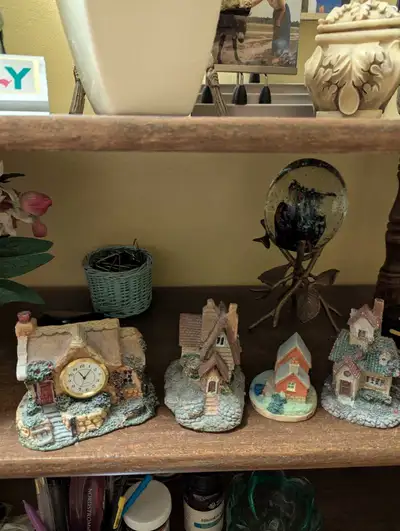 These charming house figurines are in good, used condition and ready to add a touch of whimsy to you...