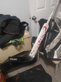 Goalie pads and stick