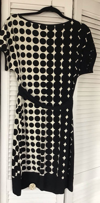 Dress black dots. In excellent condition.