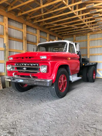 1966 Chev C-80. 24,000 original miles. 366 engine, new flat deck, new tires, zero rust. Call Ron at...