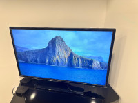 TV 40 inch Samsung with table for sale 