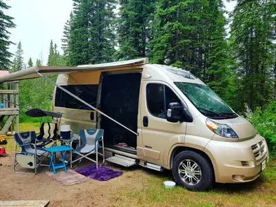 Brand new roof mounted awnings for vans, RVs,or anywhere you want protection from the sun or rain. T...