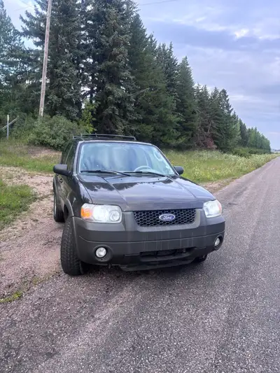 2007 ford escape. Has 280k. Runs and drives good. Comes with command start. Aftermarket stereo. ABS...