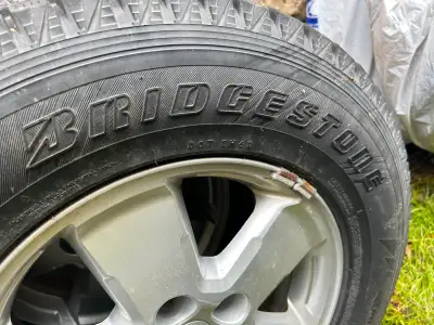 Bridgestone 235 X 70 X 16 Winter Tires Came off from Ford escape