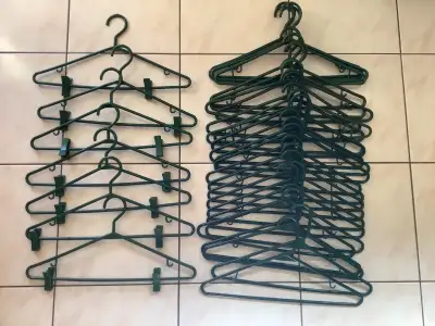 Large Lot of Dark Green Plastic Hangers, View more