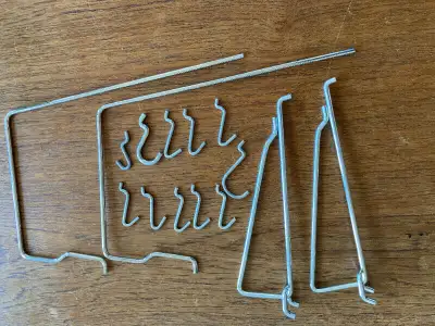 Variety of pegboard hooks and rods See photo for details