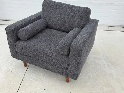 Refresh your living space with this stylish dark grey accent chair, perfect for adding a touch of mo...