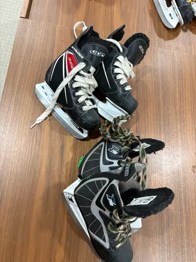 2 pairs of youth 8 skates , View more