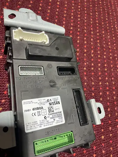 This Infiniti BCM Body Control Module Chassis Controller is a genuine OEM part number 284B1-4HB0A is...