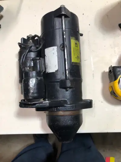 Spare starter works as it should cone 3 inches to mount nine tooth like new 300 or trade for stihl c...