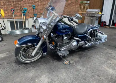 Selling our 2004 Harley Davidson Road King, a true classic with 102780 kilometers on the odometer. T...