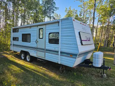 22ft topaz camper. Served us good kids out grew it. Seals should be replaced, small moisture damage...