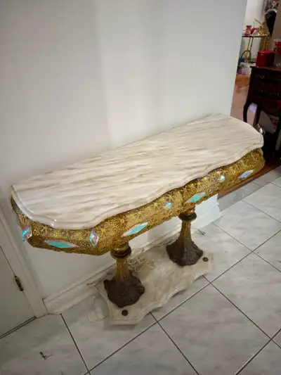 Vintage European Hall table , real Marble top, brass base. Need polishing. Sell as is . First come f...