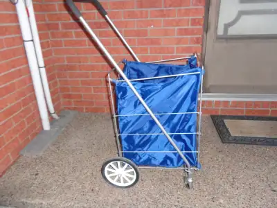 Pulling shopping cart, with a inside cart bag included, dimension, 26'' inch high, 17''inch deep, an...