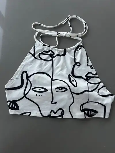 Brand new white and black polyester spandex tie back tank top.