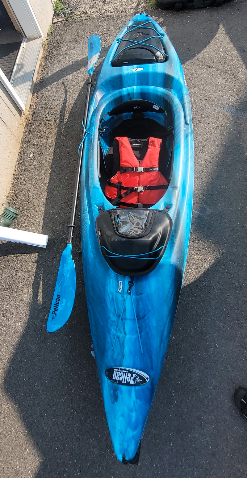 Pelican 10ft Kayak with paddle and vest. Water Sports Fredericton