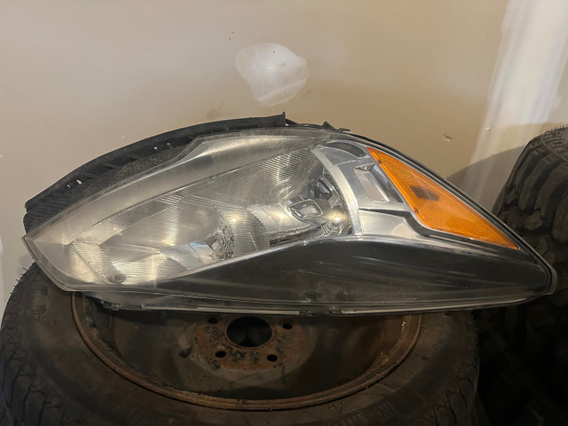 Orginal  Headlamps for Ford Escape in Auto Body Parts in Edmonton