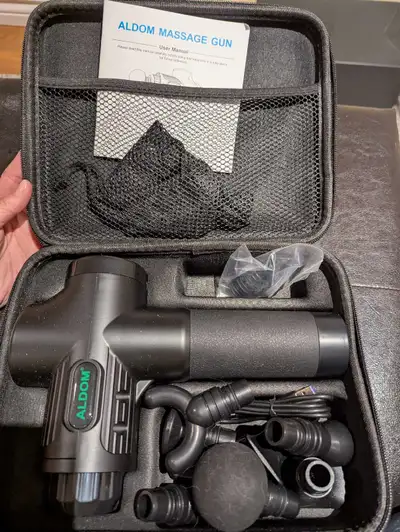 Get ready to experience deep muscle relief with the Aldom massage gun, which comes complete with mul...