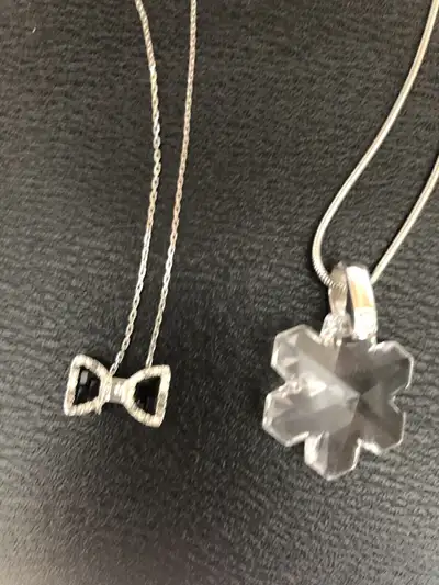  2 Swarovski necklaces., View more