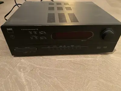 This NAD AV surround sound receiver T743, paired with NAD DVD player model T514, Great audio and vid...