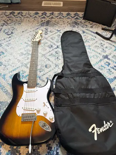 Guitar set amp, bag, and guitar stand, View more