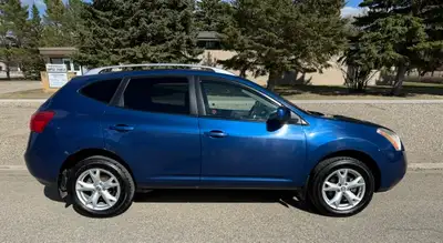 - - - - - - 2009 Nissan Rogue SL AWD PKG - - BLUE / BLACK LEATHER ** Features included are: • Stereo...