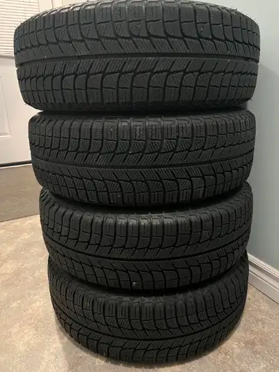 Set of 4 Michelin X ice snow tires with rims for sale, Used only for one season. 195/60R/15. 5 bolt...