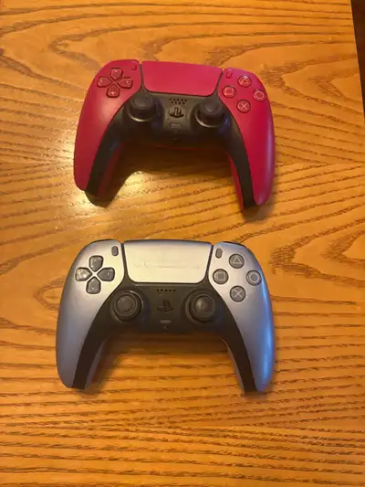 selling 2 ps5 controllers. The grey one in mint condition with only a few scuff marks and the red pe...