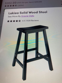 Black solid wood stool. 24” high. Assembly requiredd.