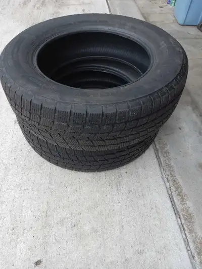 Pair of Firestone Weathergrip all weather tires. 225 65 R17 Great condition more than 50 % thread. N...