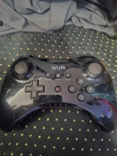Get ready to level up your gaming experience with this used Nintendo Wii U Pro Controller! It's in d...