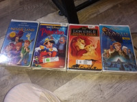 Disney movies .. never opened. (8)