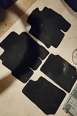 Front and back set of 4 used OEM floor mats for Jeep Wrangler JK models. Mats are used but in decent...