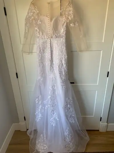 Size 12 new never worn decided on another one please call 902-877-1543 for more information and view...