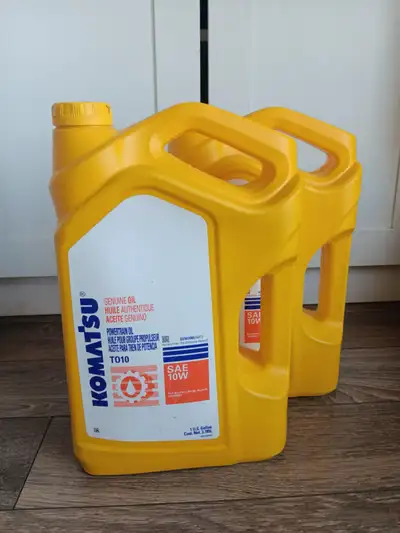 KOMATSU Powertrain Oil SAE10W Genuine oil One brand new, never open. The other 65% full Pick up in T...