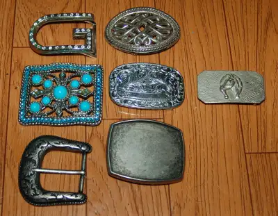 1. Buckles, from top, going right - Letter G with rhinestones - Celtic knot design marked 1997 Taiwa...