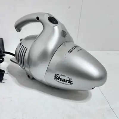 This is a Shark Turbo Hand Vac, a compact and powerful handheld vacuum cleaner perfect for quick cle...