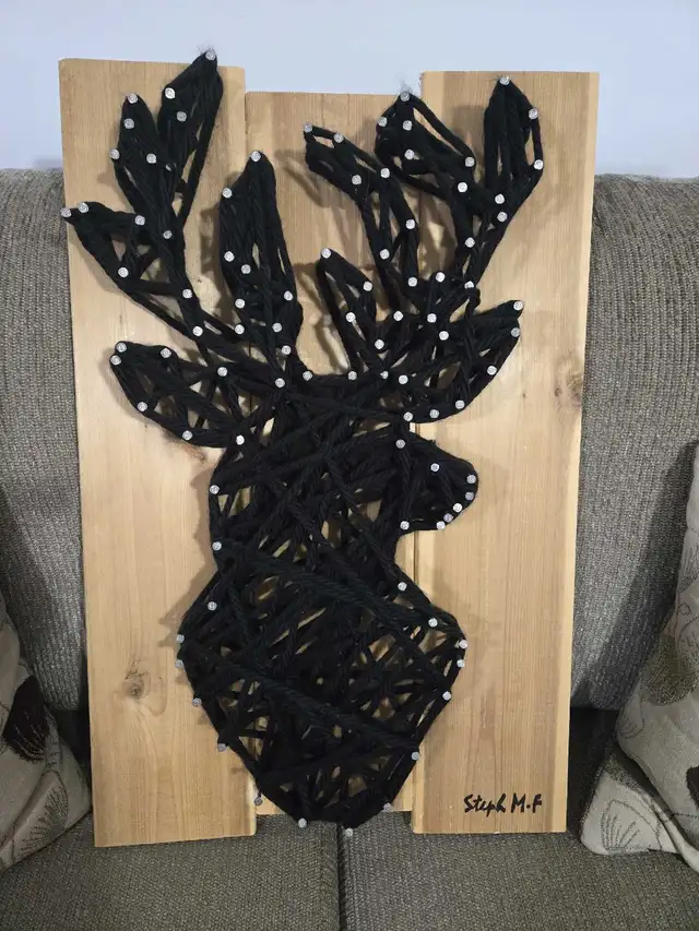 hand made deer on wood