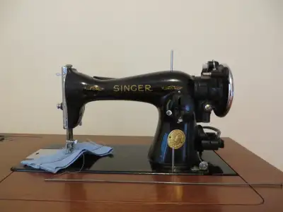 Singer Sewing Machine with Cabinet, View more