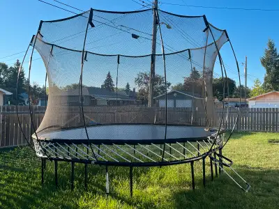 Springfree Trampoline 11’ x 11’ Square Good Used Condition Small holes in mesh per pictures.
