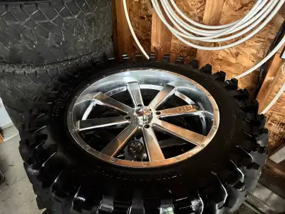 Selling a complete set of four System 3 XT400 Extreme Trail tires mounted on 22-inch MSA M34 Flash c...