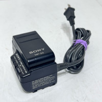 Sony battery charger ac-v25b with np-55 battery 