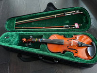 1/4 size violin good working condition.. stickers on it used.