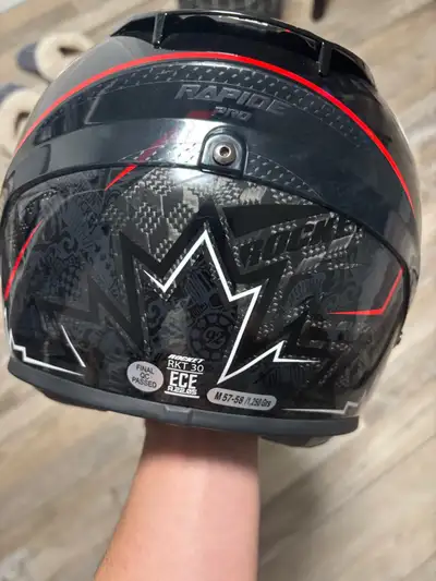 Great helmet carbon fibre so its not heavy. Size medium. Got it for $350 and i just used it for the...