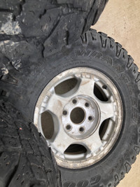 GMC 6 bolt factory rims with good year tires  + spare 