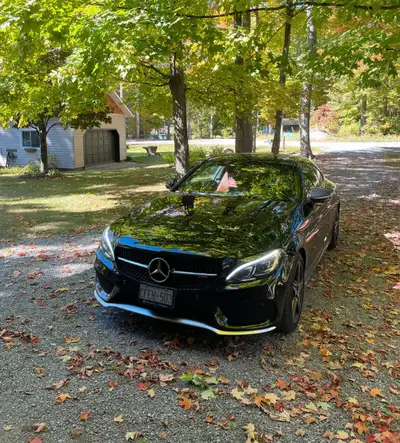 This 2018 Mercedes-AMG C43 is a high-performance compact luxury coupe . It features a 3.0-liter twin...