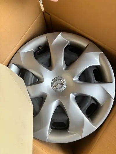 This is a new Mazda 17-inch steel rim, perfect for winter tires or as a spare. It's in pristine cond...
